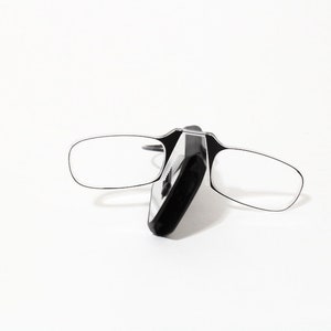 Thin optical reading glasses with the power from +1.00 to +3.00