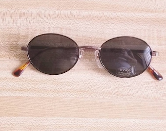 Boulevard Boutique B3052 Vintage Sunglasses 1980s Color Brown/DA. Dimensions are 48x18x140