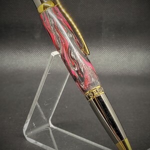 TiGold and Gunmetal Zodiac twist pen with a DiamondCast body.