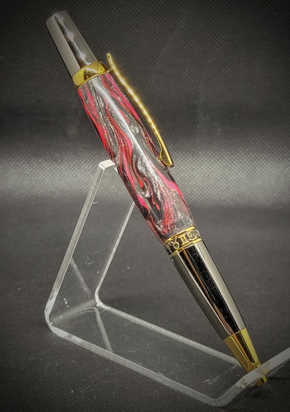 TiGold and Gunmetal Zodiac twist pen with a DiamondCast body.