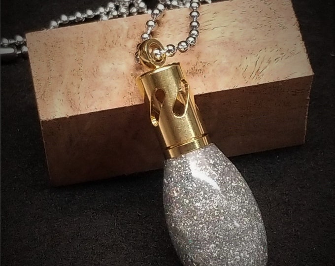 Aromatherapy Necklace in Brass made with diamond infused resin.