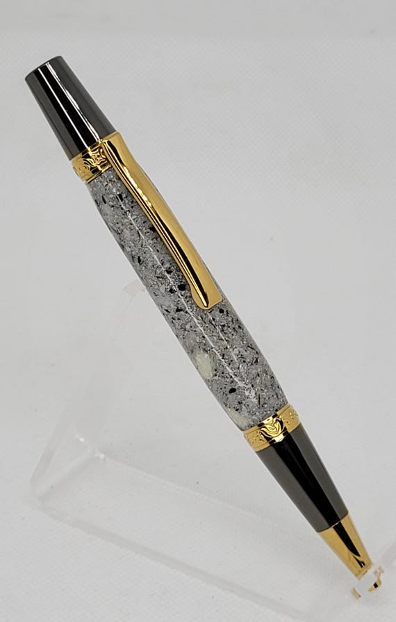 LeRoi Elegant pen in TiGold (Titanium Gold) and Gun Metal faux granite body.