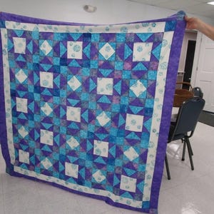 Large Reversible Lap Quilt in Cotton Batiks. 67”x67”.