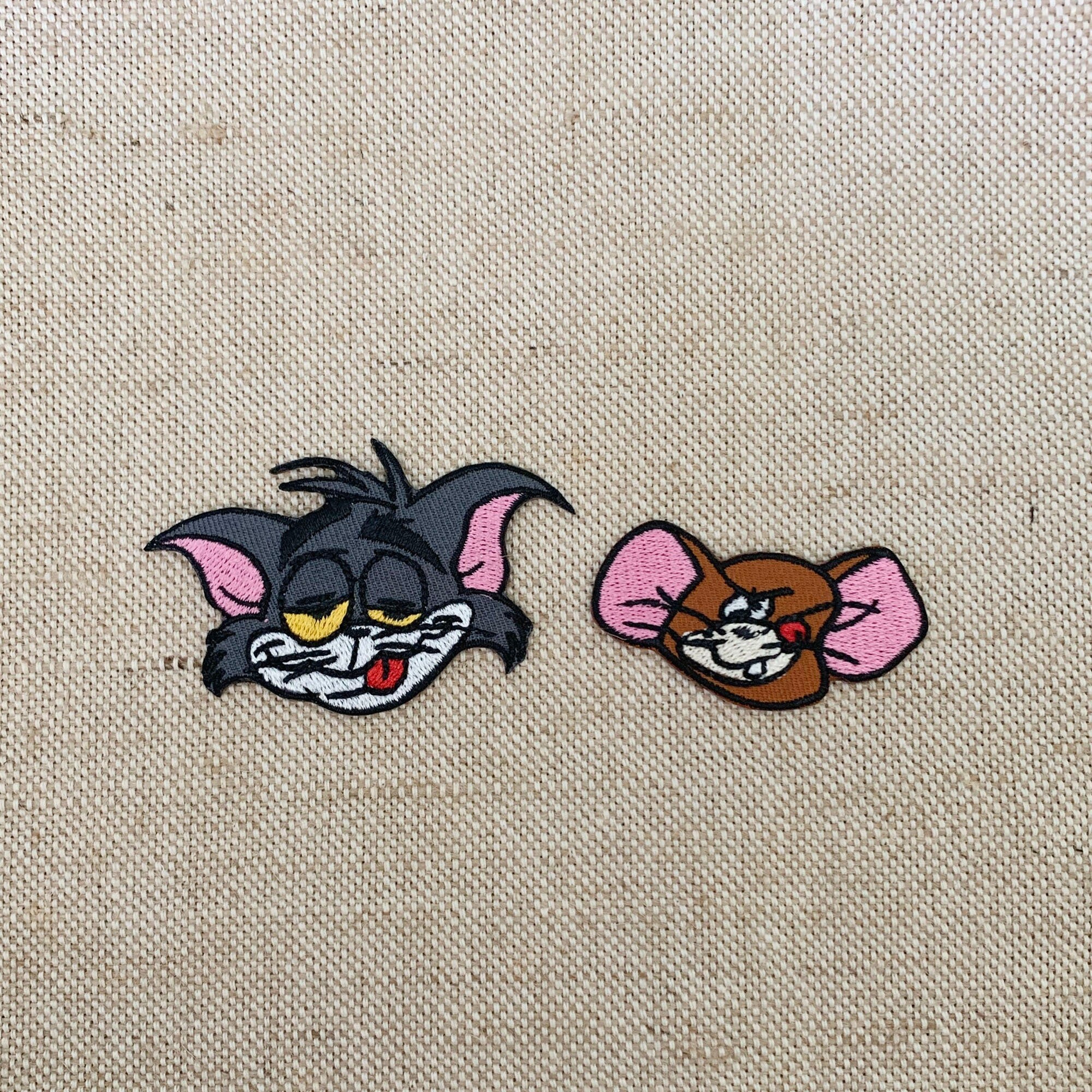 tom and jerry wearing coat