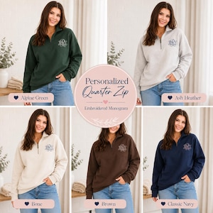 May include: A collection of five quarter-zip sweatshirts in alpine green, ash heather, bone, brown, and classic navy. Each sweatshirt features a silver-toned zipper, long sleeves, and a custom embroidered monogram on the upper left chest area.
