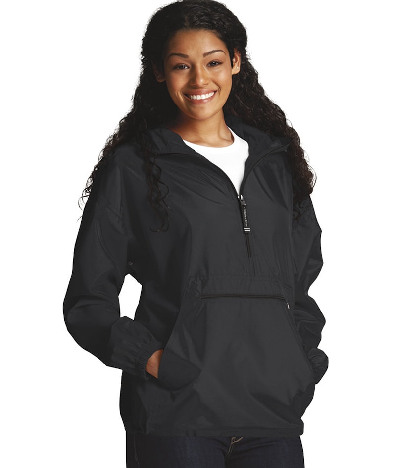 May include: A black hooded jacket with a zipper closure and a kangaroo pocket. The jacket has a drawstring hood and elastic cuffs.