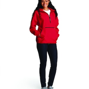 May include: A red hooded jacket with a zipper closure and a large front pocket. The jacket has a black zipper and black trim around the hood and pockets.