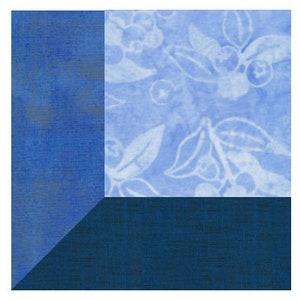 May include: A blue fabric square with a patterned section. The pattern is of white leaves and blue berries on a light blue background.