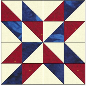 May include: A quilt block with a starburst pattern in red, white, and blue. The starburst is made up of triangles.
