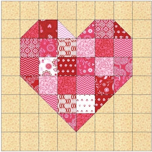 May include: A patchwork heart quilt block with a variety of pink, red, and white floral and geometric patterns. The block is set on a grid of 9 squares by 9 squares.