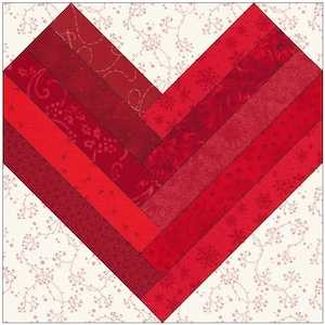 May include: A red heart-shaped quilt block made from strips of fabric in various shades of red. The fabric has different patterns, including snowflakes, stars, and swirls.