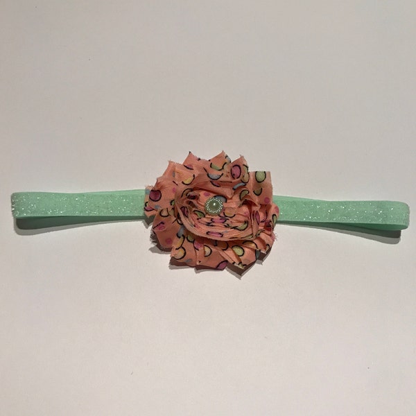 Mint green baby headband with pink flower