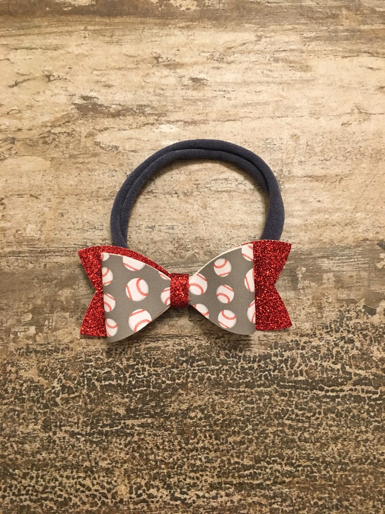 Baseball and red glitter faux leather bow with dark grey nylon headband