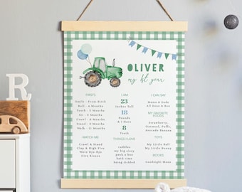 May include: A green and white printable chart with a tractor illustration. The chart is titled "Oliver, my 1st year" and includes details about the child's first year, such as milestones, measurements, favorite foods, and toys.