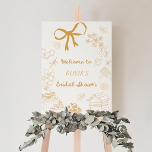 Editable bridal shower welcome sign featuring hand-drawn honey bees, honey jars, and a yellow bow. Perfect for a Bride to Bee or She Found Her Honey themed wedding shower.
