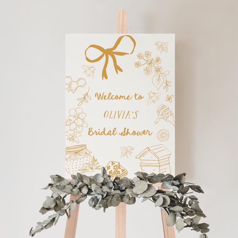Editable bridal shower welcome sign featuring hand-drawn honey bees, honey jars, and a yellow bow. Perfect for a Bride to Bee or She Found Her Honey themed wedding shower.