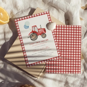 May include: A red tractor birthday invitation with a gingham border. The invitation includes the text "Start Your Tractor" and event details. A seashell and two blue balloons are also featured.