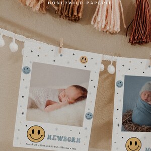 May include: Two white photo cards with a baby photo on each. The cards have a blue and yellow smiley face design with stars and snowflakes. The text on the card reads "NEWBORN" and "March 23, 2021 at 8:20 PM - 7lbs 3oz - 19in".