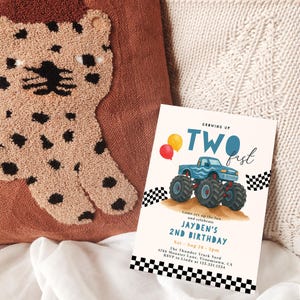 Blue monster truck 2nd birthday invitation with “Two Fast” wording, checkered flags, balloons, and editable text. Perfect for a crash bash or monster truck party theme for boys.