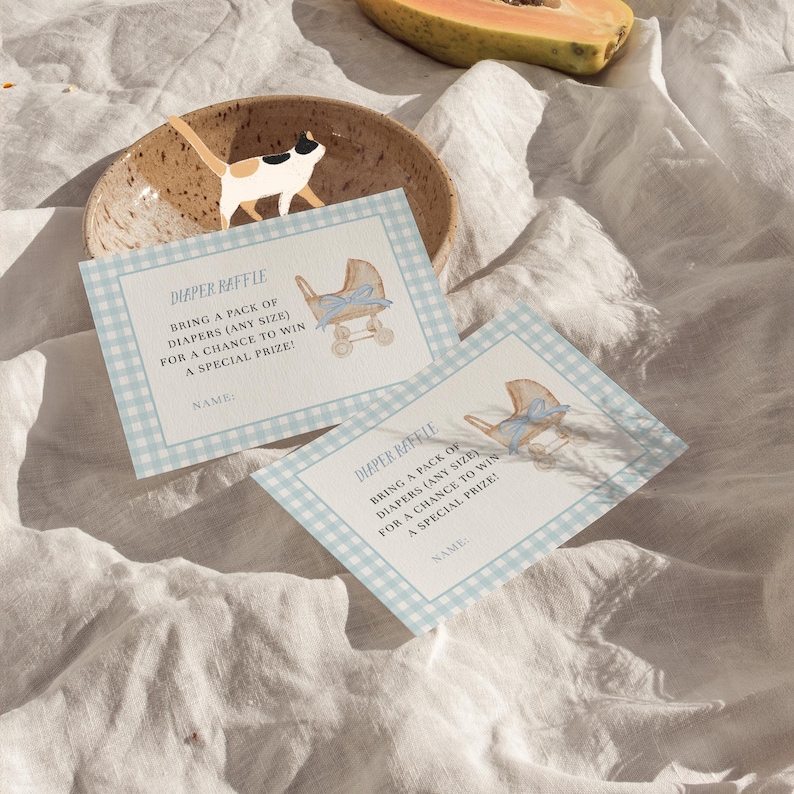 Blue gingham baby shower invitation set featuring a vintage baby carriage illustration, soft baby boy colors, and classic traditional styling. Editable baby shower bundle with coordinated invitation, books for baby card, diaper raffle ticket, and thank you card for an elegant and timeless celebration.