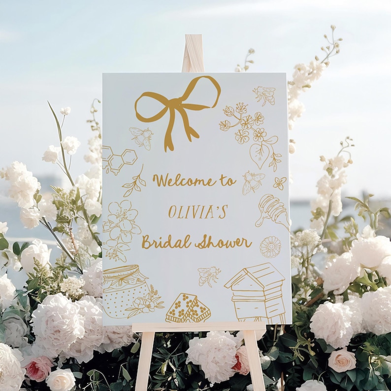 Editable bridal shower welcome sign featuring hand-drawn honey bees, honey jars, and a yellow bow. Perfect for a Bride to Bee or She Found Her Honey themed wedding shower.