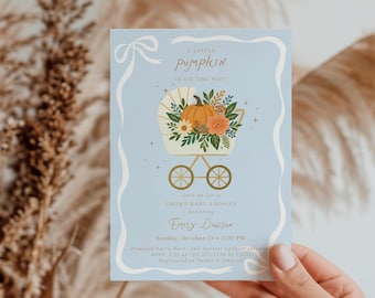 May include: A light blue baby shower invitation card with a decorative stroller design. The stroller holds a pumpkin and floral arrangement. The text reads "A Little Pumpkin is on the Way!" and includes event details for Emily Dawson.