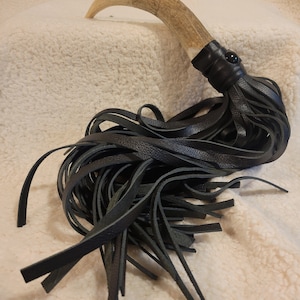 VOLWASSEN Flogger met elandhoorn