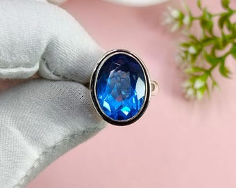 Anillo de tanzanita hecho a mano: anillo de promesa de plata esterlina con forma ovalada facetada.