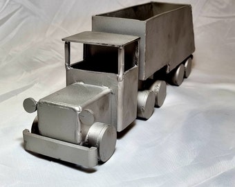 Truck with trailer made from stainless steel scrapmetal