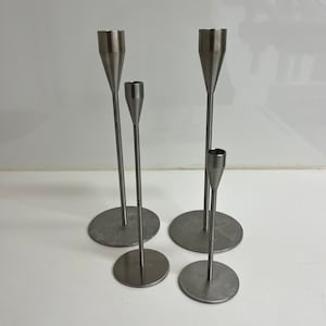 A set of 4 Piet Hein candle Holders