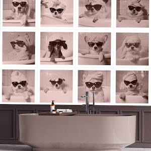 May include: Sepia-toned wall art featuring twelve dogs in bathtubs, each wearing sunglasses and a towel on their head. A modern, oval-shaped bathtub is in the foreground, with a tray of bath products.