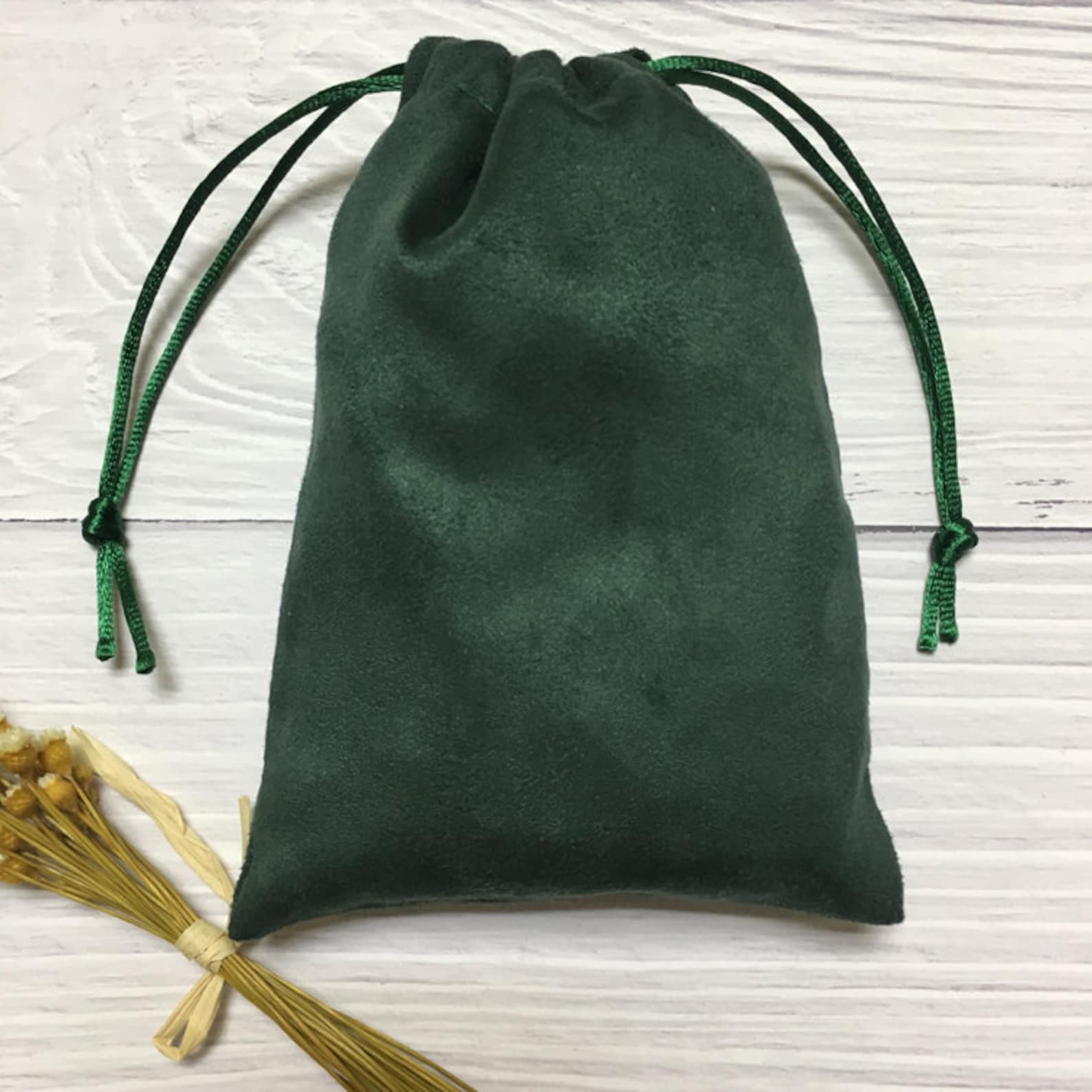 green pouch bag