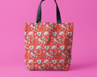 May include: A red tote bag featuring a colourful pattern of roller skates, skulls, hearts, and eyes. The pattern is repeated across the entire bag.