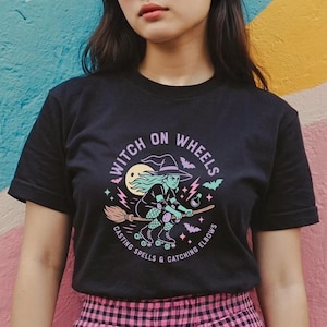 Unisex Skate Witch T-Shirt With Pastel Goth Print, Funny Roller Skate Shirt for Spooky Girls and Derby Babes
