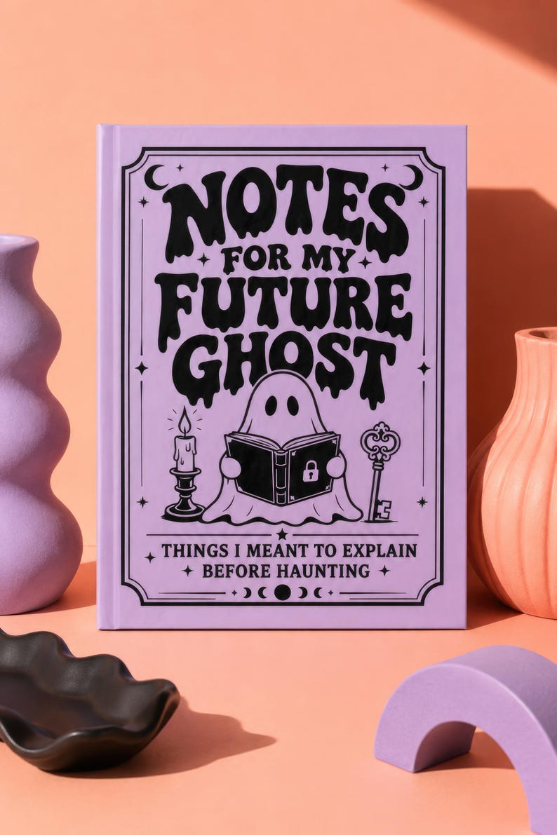 A 5 by 7 inch hardcover journal with a matte pastel purple cover and black printed graphics. The front features a retro inspired illustration of a white ghost character. One design shows the ghost holding a locked book flanked by a lit candle and a skeleton key with text reading Notes For My Future Ghost. The other shows the ghost peeking over a blank label with text reading Property Of The Future Ghost. Both include crescent moons, four point stars, and vintage decorative border frames.