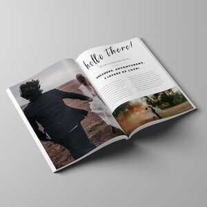 Puede incluir: Una revista abierta con el texto "hello there!" en la portada. La revista presenta una pareja corriendo en una playa con un fondo humeante.