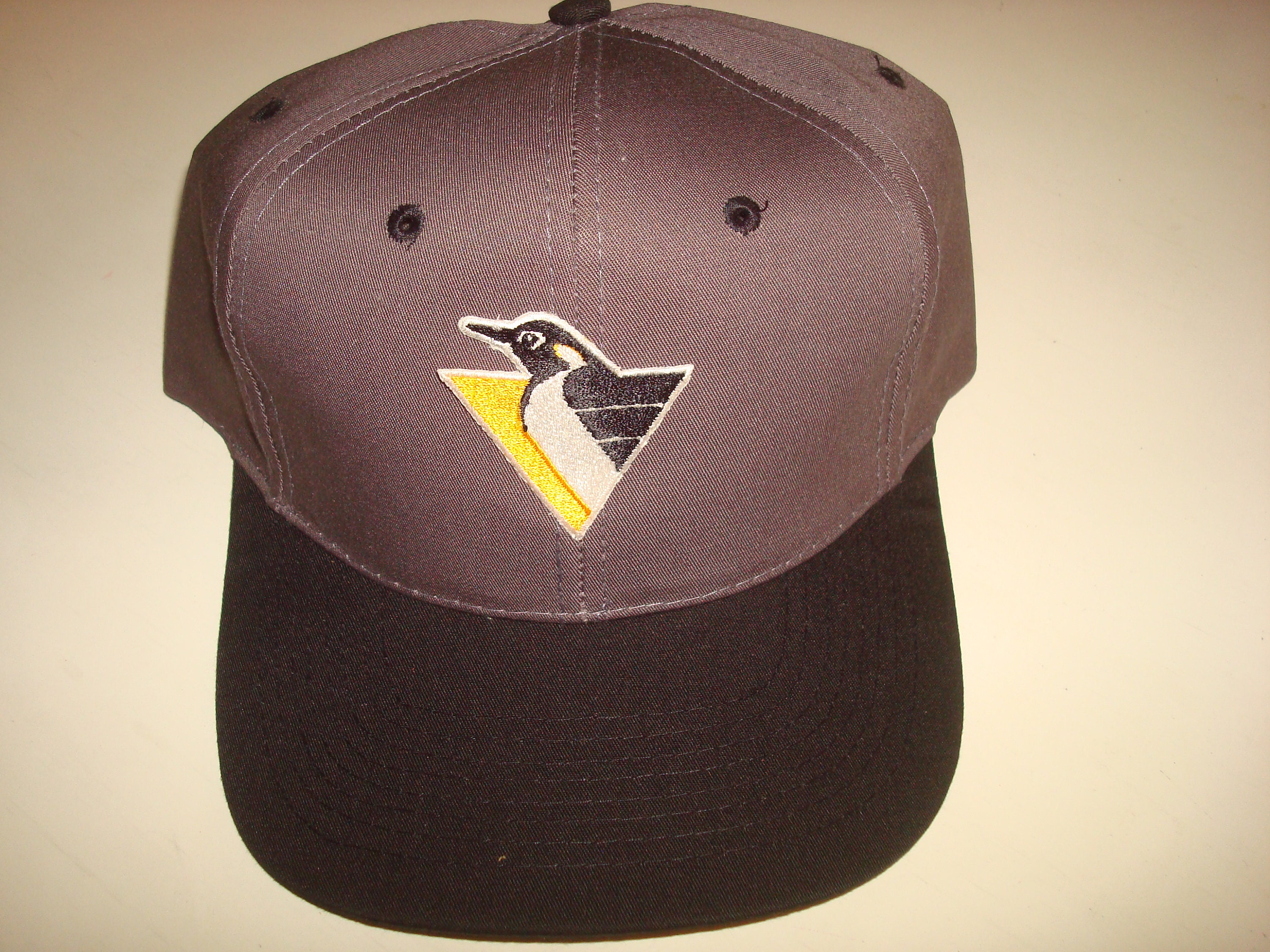 retro penguins hat