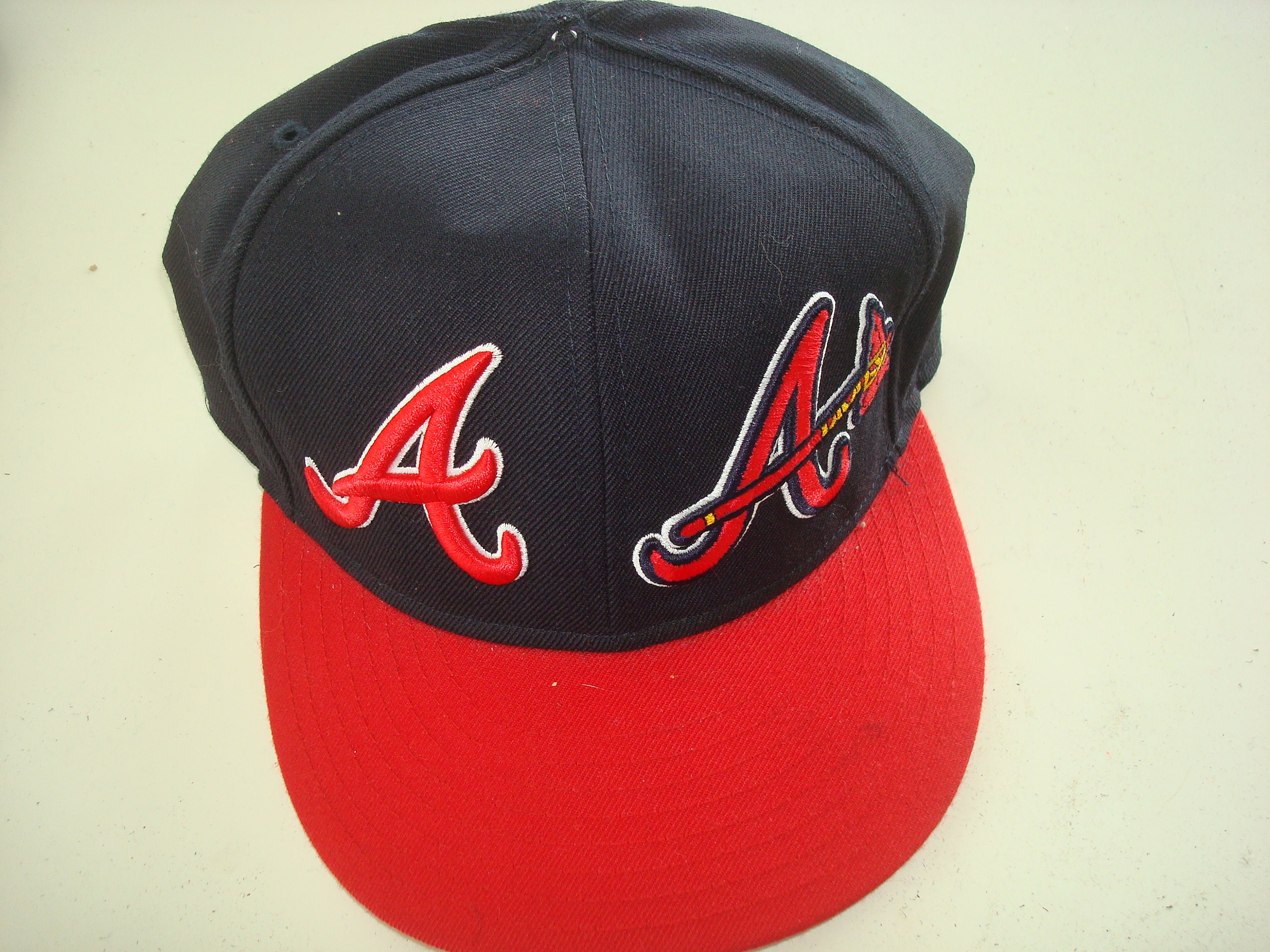 Lids Atlanta Braves Tokens and Icons Game-Used Baseball Yarn Bracelet