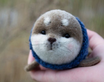 Needle felted seal pup in knitted sweater