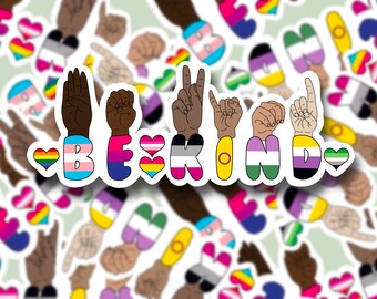May include: A set of six colorful stickers with hand signs spelling out "BE KIND". Each letter is decorated with a different pride flag, including the transgender, bisexual, pansexual, genderqueer, lesbian, and non-binary flags.
