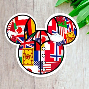 May include: A Mickey Mouse-shaped sticker with a collage of flags from different countries. The flags include the United States, Canada, United Kingdom, France, Germany, Italy, Japan, and more.