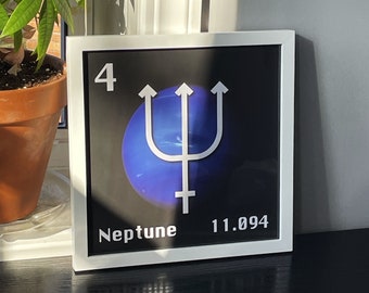 Arte enmarcado con el símbolo astronómico de Neptuno