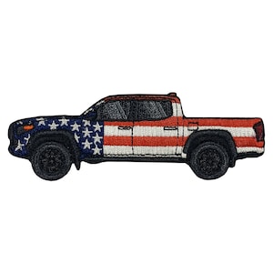 May include: A red, white, and blue pickup truck with an American flag design. The truck is a side profile view.