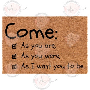 May include: A rectangular doormat with a brown, textured surface. The black text reads "Come:" followed by three lines: "As you are," "As you were," and "As I want you to be." Each line has a checkmark.