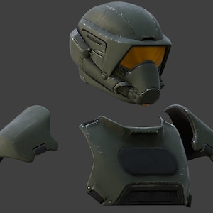 Pode incluir: Um capacete verde e preto de estilo militar com viseira e placa de peito e ombreiras combinando.