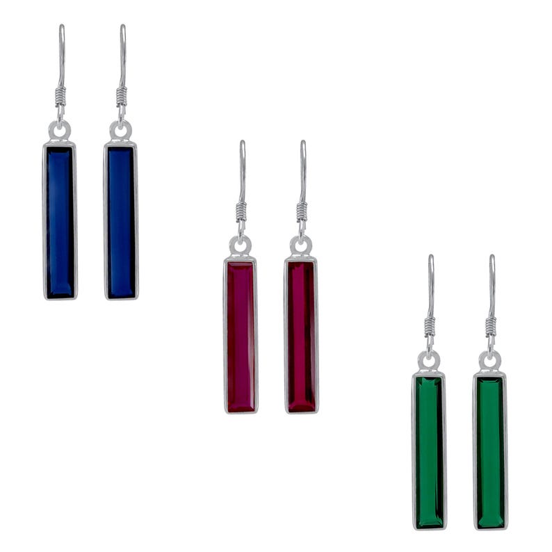 May include: Three pairs of dangle earrings with silver hooks and rectangular colored stones. The first pair has blue stones, the second pair has red stones, and the third pair has green stones.