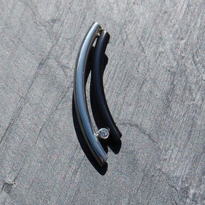 Silver with black zirconium pendant and a cubic Zirconia stone