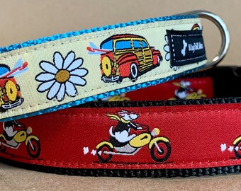 May include: Two dog collars. One is light yellow with a blue trim, featuring a red and brown woody car and white daisy pattern. The other is red with a cartoon dog riding a motorcycle. Both have a metal D-ring.