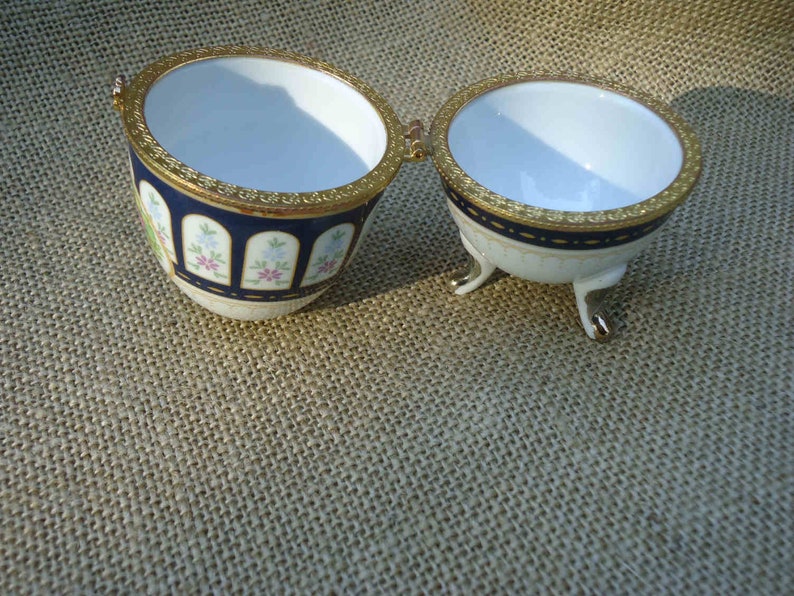gold interior surround at join gold on feet French Vintage floral panels and design hinged China egg shaped trinket box
