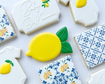 Lemon blue tile Mediterranean Baby Shower sugar cookies, personalized baby onesie with lemon shower favors from grandma, 1 dz